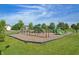 A spacious playground with multiple play structures set in a safe, landscaped environment for children at 5560 Goodwin St, Indianapolis, IN 46234