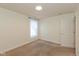 Bedroom features neutral carpet, a flush-mount ceiling light, and a window at 5891 Mimosa Dr, Indianapolis, IN 46234