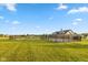 Community pool with fenced-in area, surrounded by a well-maintained lawn at 5891 Mimosa Dr, Indianapolis, IN 46234