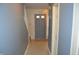 Entryway featuring the front door, staircase, and neutral wall paint at 6056 Blackley Ct, Indianapolis, IN 46254