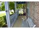 Inviting front porch with comfortable seating and views of the landscaped yard at 6056 Blackley Ct, Indianapolis, IN 46254
