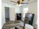 Bedroom featuring new floors, neutral paint, and natural light at 6213 Selago Dr, Indianapolis, IN 46203