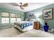 Bright bedroom with a ceiling fan and natural light at 6220 Spring Mill Rd, Indianapolis, IN 46260