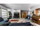 Spacious living room with piano and comfortable seating at 6220 Spring Mill Rd, Indianapolis, IN 46260
