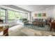 Cozy living room with a large bay window and plenty of natural light at 6220 Spring Mill Rd, Indianapolis, IN 46260
