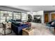 Bright living room with comfortable seating, TV and a modern design at 6220 Spring Mill Rd, Indianapolis, IN 46260