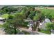 A home surrounded by lush trees and greenery in a rural area, defined with a red perimeter line at 71 W County Road 500 S, Clayton, IN 46118
