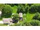 Overhead shot of the home, highlighting the roof, surrounding greenery and a lovely outdoor space at 71 W County Road 500 S, Clayton, IN 46118
