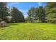 Large backyard featuring a chicken coop at 71 W County Road 500 S, Clayton, IN 46118