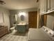 Well-lit bathroom boasts modern vanity, stylish tile floors, and convenient laundry appliances at 71 W County Road 500 S, Clayton, IN 46118