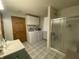 Bathroom with shower, washer, and dryer at 71 W County Road 500 S, Clayton, IN 46118