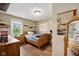 Bedroom featuring hardwood floors, a window, and wooden furniture at 71 W County Road 500 S, Clayton, IN 46118
