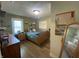 Olive green bedroom with wooden dresser and bed at 71 W County Road 500 S, Clayton, IN 46118