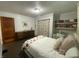 Neutral bedroom with Strawberry Shortcake themed bed, with access to ensuite bathroom at 71 W County Road 500 S, Clayton, IN 46118