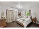 Cozy bedroom featuring built-in shelving and a window seat at 71 W County Road 500 S, Clayton, IN 46118