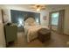 Charming bedroom features an ornate bed, wood-paneled accent wall, and stylish decor at 71 W County Road 500 S, Clayton, IN 46118