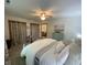 Cozy bedroom with comfortable bedding, floral curtains, and warm lighting at 71 W County Road 500 S, Clayton, IN 46118