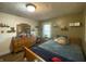 Olive green bedroom with wooden dresser and bed at 71 W County Road 500 S, Clayton, IN 46118