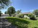 Lovely single-story home with lush greenery, detached garage, and a spacious driveway at 71 W County Road 500 S, Clayton, IN 46118