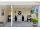 Covered porch featuring a welcoming entrance with wreaths and potted plants at 71 W County Road 500 S, Clayton, IN 46118
