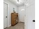 Inviting hallway with charming wooden storage unit and a neutral color palette at 71 W County Road 500 S, Clayton, IN 46118