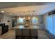 Bright kitchen features shaker cabinets, a large center island with seating, and ample counter space at 71 W County Road 500 S, Clayton, IN 46118