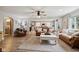 Comfortable living room featuring neutral walls, hardwood floors, and an inviting arrangement of furniture at 71 W County Road 500 S, Clayton, IN 46118
