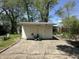 Outdoor shed with double doors and ample storage on a concrete foundation at 71 W County Road 500 S, Clayton, IN 46118