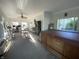 Spacious sunroom with a dining table, hot tub, and exercise equipment at 71 W County Road 500 S, Clayton, IN 46118