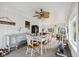 Sunroom with a dining set, exercise equipment, and tongue and groove ceiling at 71 W County Road 500 S, Clayton, IN 46118