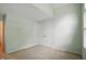 Light green bedroom with double door closet, neutral carpet and transom window at 7329 Pymbroke Dr, Fishers, IN 46038