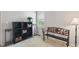 Charming bedroom showcasing a decorative bench, shelving and other decor at 7329 Pymbroke Dr, Fishers, IN 46038