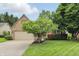 Charming single-Gathering home with a two-car garage, well-maintained lawn and mature trees at 7329 Pymbroke Dr, Fishers, IN 46038