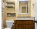 Yellow bathroom featuring a dark wood vanity, and nautical themed shower curtain at 740 Carya Sq, Columbus, IN 47201