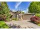 Charming home with a two-car garage, mature trees and nicely manicured landscaping at 740 Carya Sq, Columbus, IN 47201