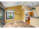 Open floor plan with views of the kitchen featuring tile floors and lots of natural light at 740 Carya Sq, Columbus, IN 47201