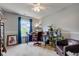 Bedroom featuring a desk, chair, a large window, and neutral walls at 7452 Lace Bark Ct, Avon, IN 46123
