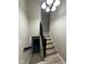 The carpeted steps lead up, while alternate steps lead down to a basement or lower level at 7514 Ruskin Pl, Indianapolis, IN 46226