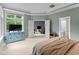 Airy bedroom featuring large windows and ensuite bathroom at 7624 William Penn Pl, Indianapolis, IN 46256
