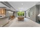 Basement game room featuring a pool table under a stylish chandelier, perfect for entertaining at 7624 William Penn Pl, Indianapolis, IN 46256