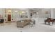 Bright living room with fireplace, piano, and staircase at 7624 William Penn Pl, Indianapolis, IN 46256