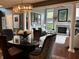 Formal dining room showcases natural light and open access to the comfortable living room at 7661 Carriage House Way, Zionsville, IN 46077