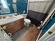 A tight shot of a bathroom with a vanity, mirror, toilet, and shower with a partial curtain at 7733 Sergi Canyon Dr, Indianapolis, IN 46217