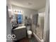 Bathroom featuring a walk-in shower, stylish vanity, and modern fixtures at 7733 Sergi Canyon Dr, Indianapolis, IN 46217