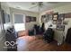 A bedroom with decor and musical instruments at 7733 Sergi Canyon Dr, Indianapolis, IN 46217