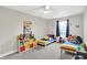 Bright bedroom with two twin beds and colorful decor, creating a fun space at 8266 Glacier Ridge Dr, Fishers, IN 46038