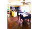 Open kitchen features stainless steel appliances, island, and dining area at 8357 Harrison Dr, Lawrence, IN 46226