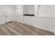 Finished basement featuring vinyl floors, wainscoting, and built-in storage cabinets with a wet bar at 860 Chatham Hills Blvd, Westfield, IN 46074