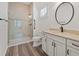 Modern bathroom featuring a glass-enclosed shower, granite countertop vanity, and sleek fixtures at 860 Chatham Hills Blvd, Westfield, IN 46074