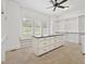 Walk-in closet featuring a center island with a black countertop and ample shelving for storage at 860 Chatham Hills Blvd, Westfield, IN 46074